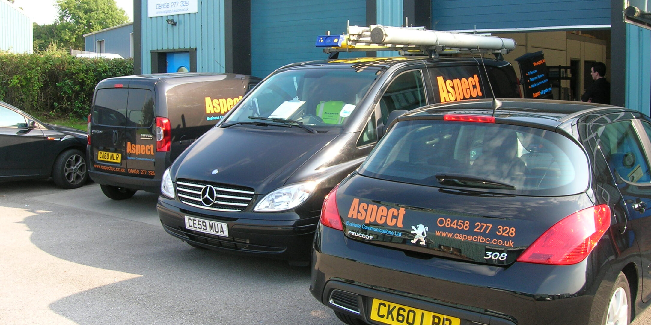 Vans-Sept11 Aspect vehicles outside of support headquarters.