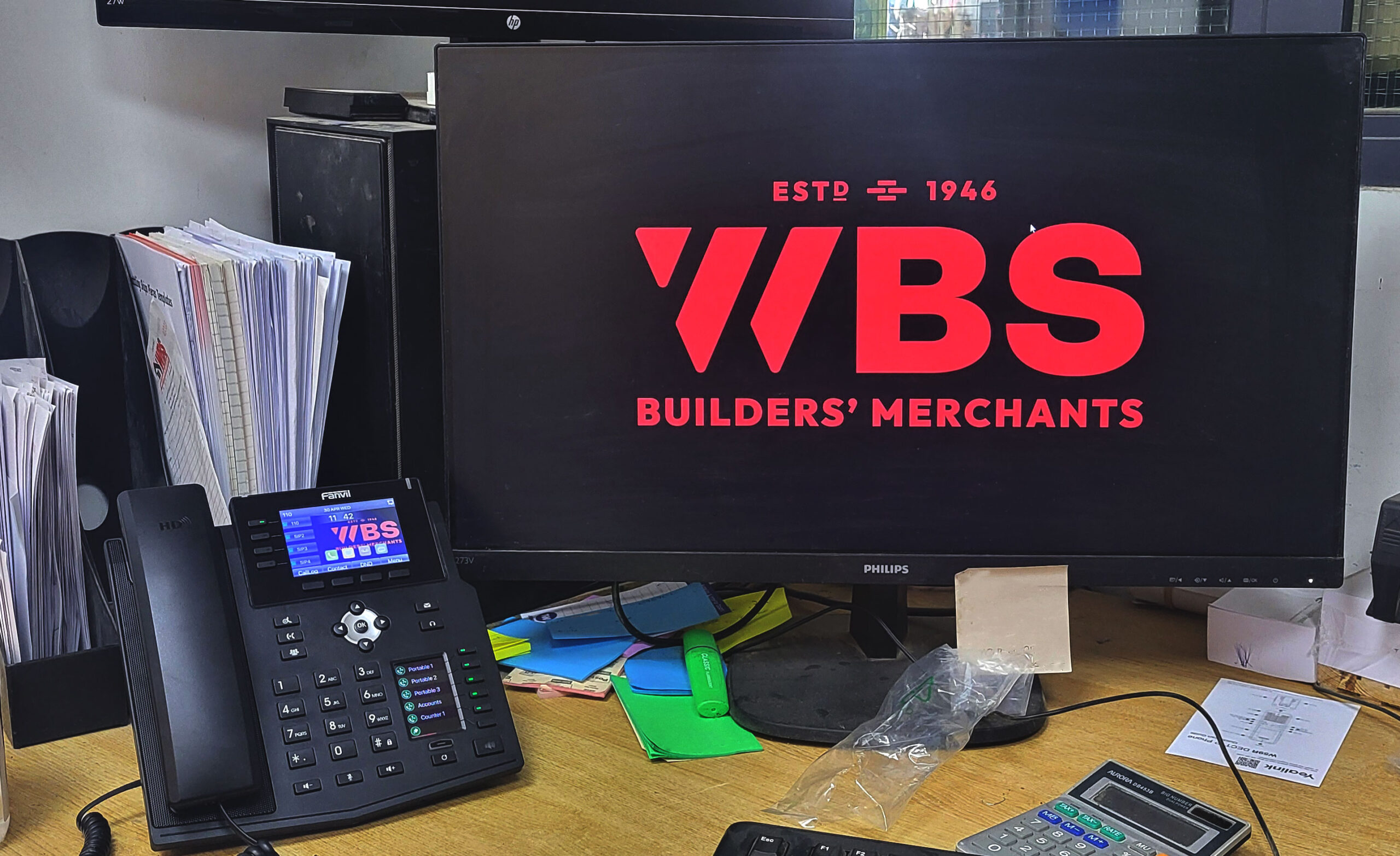 20250430_114212 An Office at Whitchurch Builder Supplies showing VOIP deskphones.